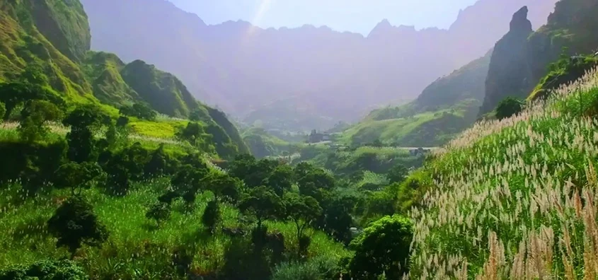 Lush green valleys and towering peaks seen during a Cape Verde cruise island-hopping adventure