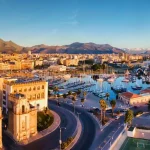 Sunset over Palermo’s harbour and cityscape, a vibrant hub for cultural Sicily travel experiences