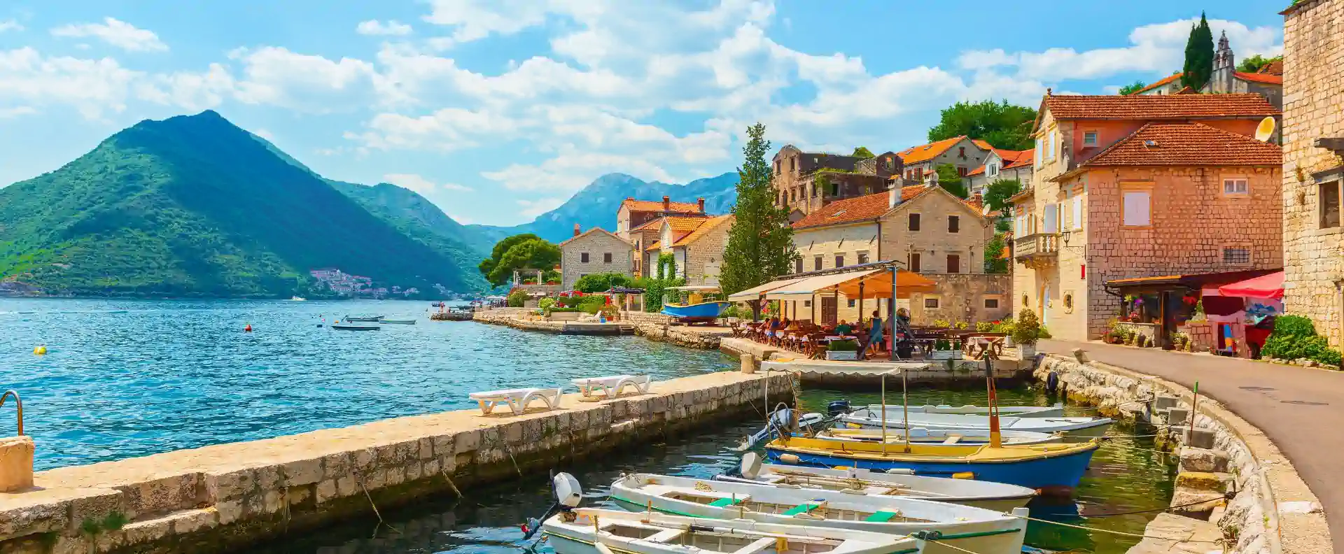 Charming waterfront village in Kotor Bay, Montenegro, a highlight of an Adriatic Sea cruise Charming waterfront village in Kotor Bay, Montenegro, a highlight of an Adriatic Sea cruise