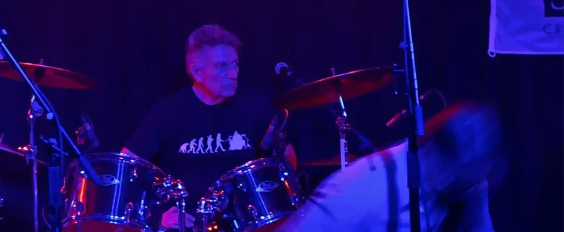 Seafarer Managing Director Chris Lorenzo playing drums during the 30 Years of Seafarer celebration.