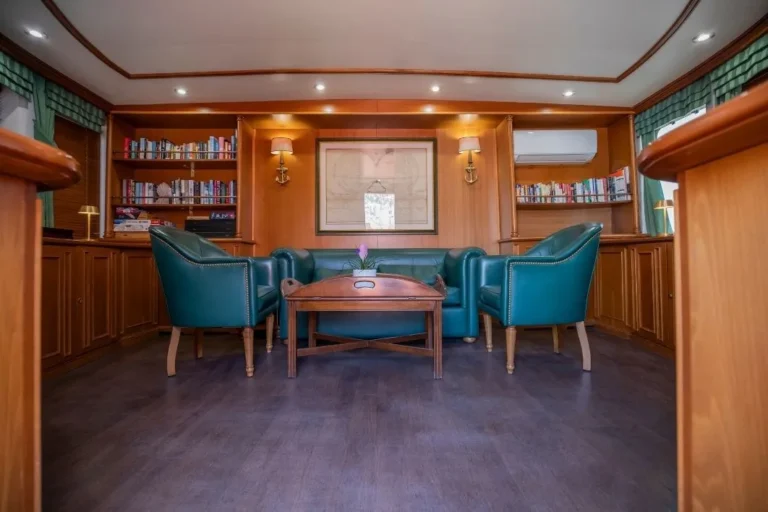 Library with wraparound windows on M/Y Callisto
